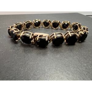 Black spinel tennis bracelet in gold over sterling silver